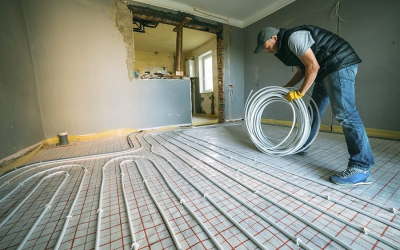Man Installing Radiant Floor Heating